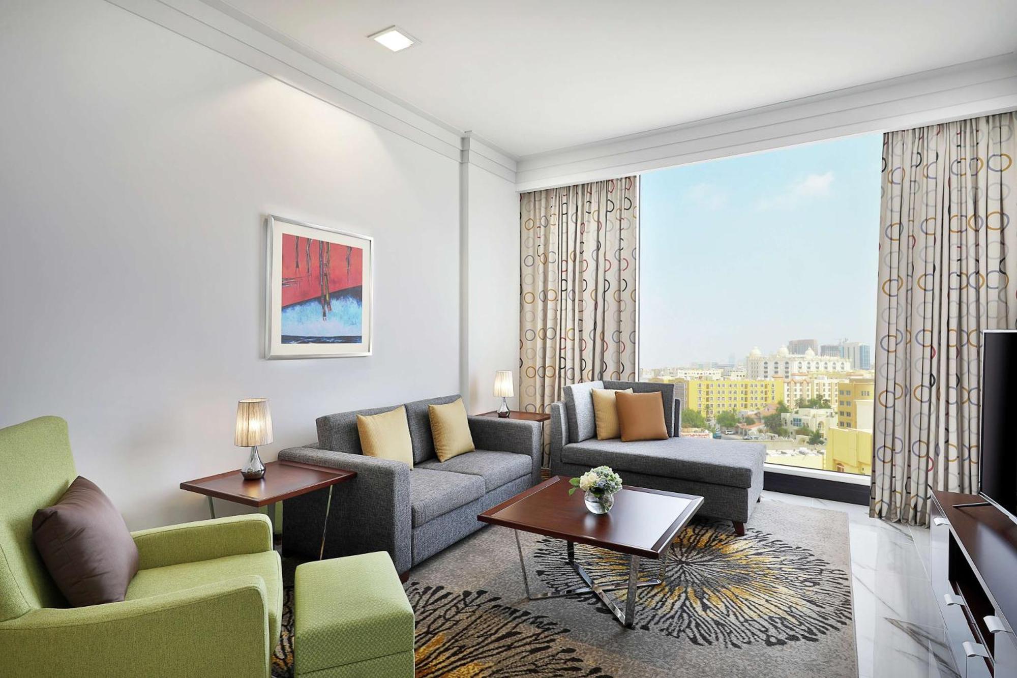 Doubletree By Hilton Doha - Al Sadd Hotel Exterior foto Living room